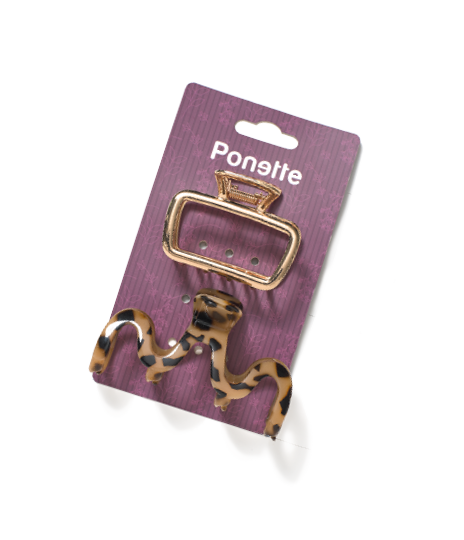 Dos pinzas para el cabello de estilo moderno, una met lica dorada rectangular y otra con dise o de animal print en tonos marrones y negros, sobre un fondo morado con la marca Ponette. Descripci n generada con IA
