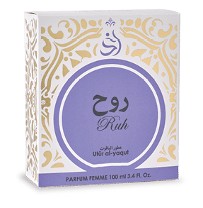 Caja de perfume con dise o ornamental dorado y texto en rabe y franc s sobre fondo blanco y morado.  Descripci n generada con IA