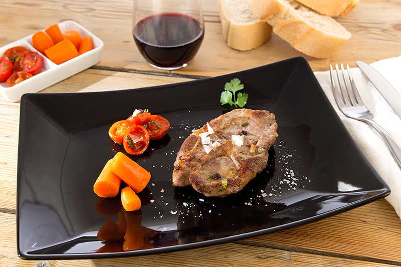 Medallones de cerdo con verduras